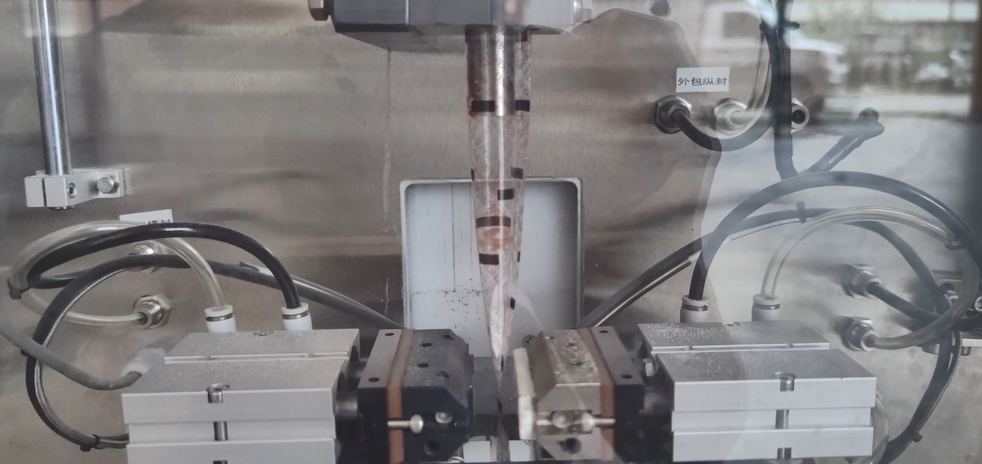 Close view of pouch sealing hardware